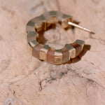 Carved moonstone hoops designed by Isabel Delgado crafted in gold