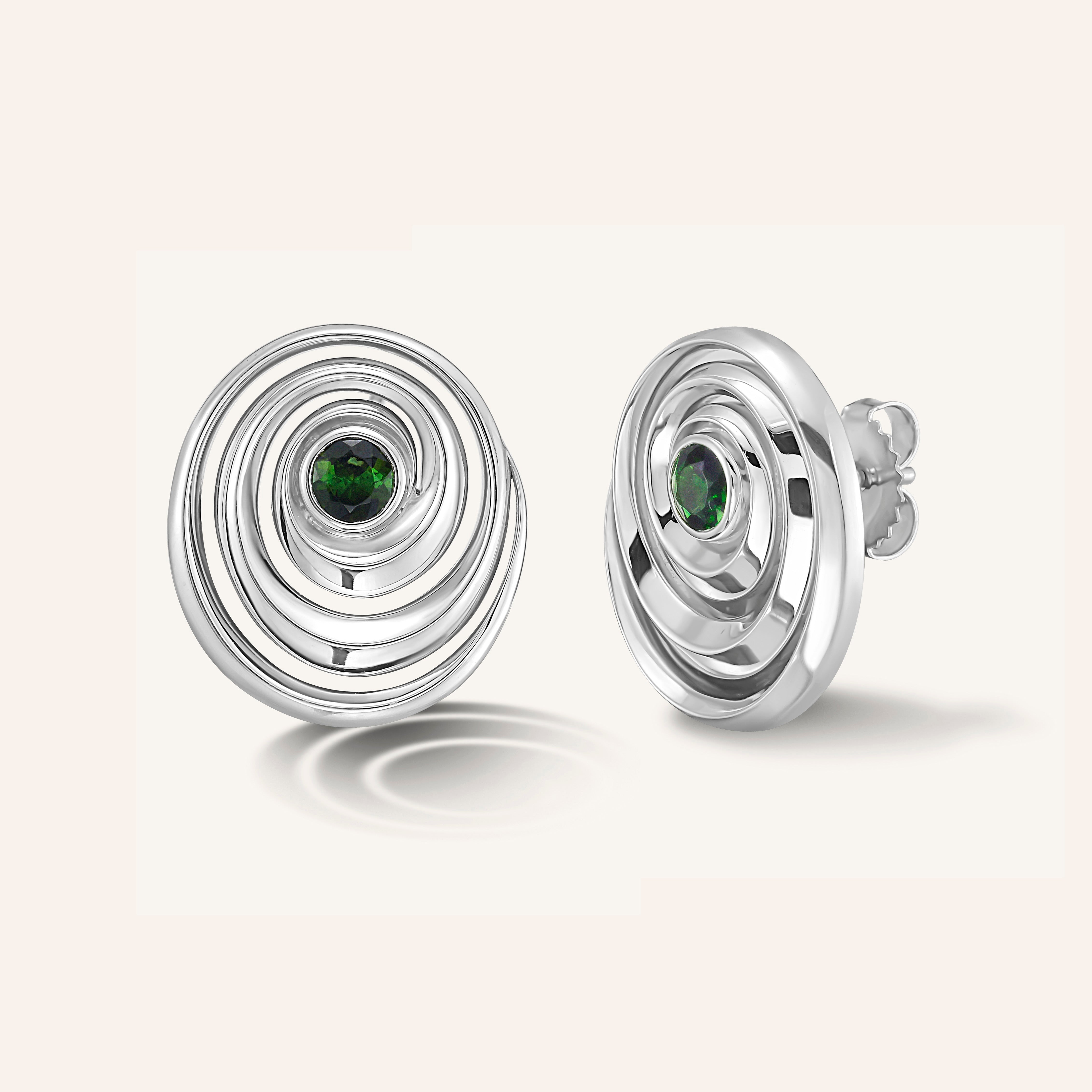 Studs that form a spiral set with green tourmaline gemstones