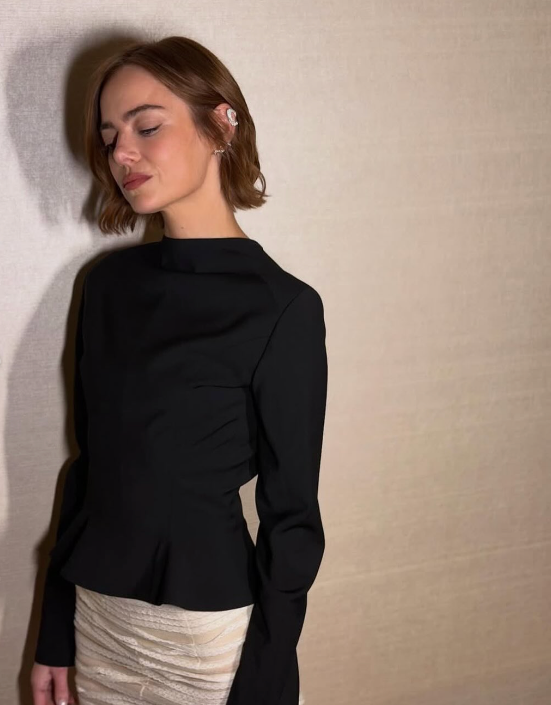 Emma Stone wears the Maria diamond earrings and spessartite wave earring for the WMag Best Performances party, styled by Petra Flannery.