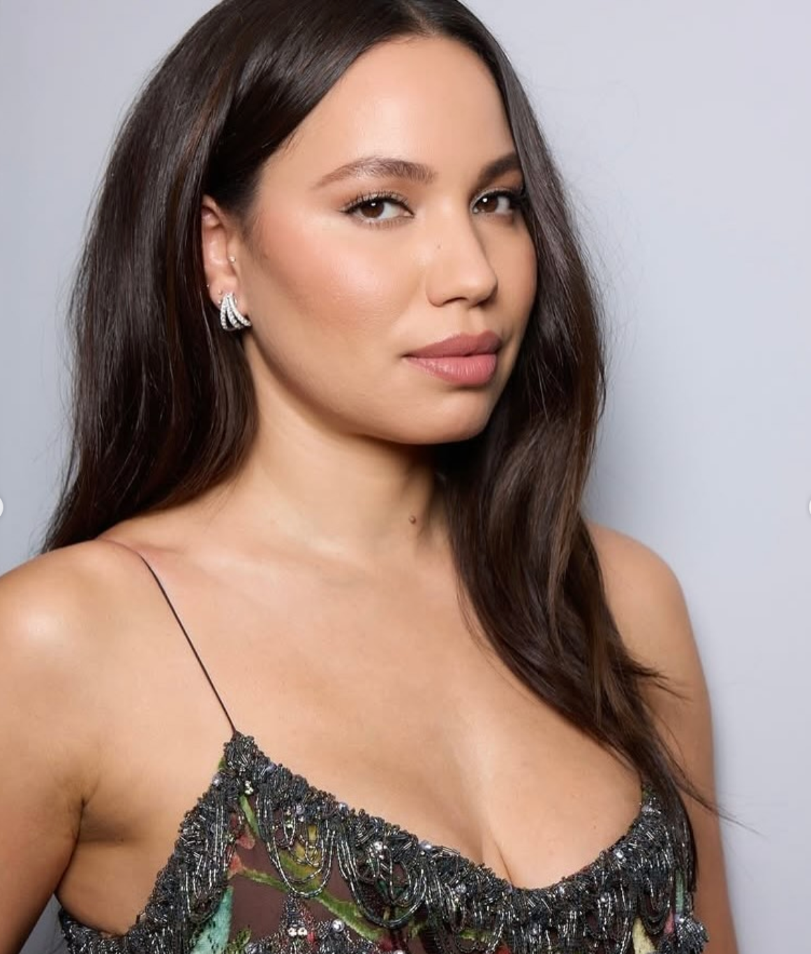 Jurnee Smollett wears the triple row diamond earrings to the premiere of "Smoke" in NYC, styled by Jamie Mizrahi. 