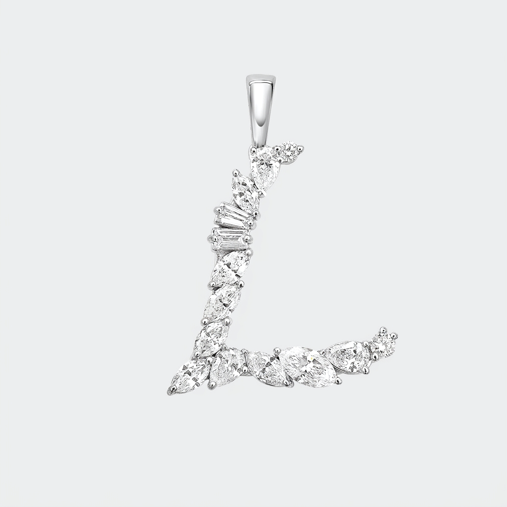 A white gold 'L' mixed cut diamonds, set against a solid light gray background.