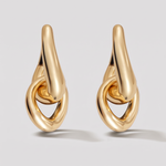 A pair of gold teardrop-shaped hoop earrings with an integrated interlocking ring design, shown on a light gray background.