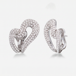 A pair of white-gold interlocking heart-shaped earrings paved with diamonds shown from front and side angles on a light gray background.