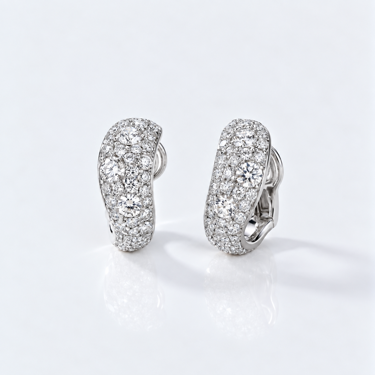 wave diamond earrings with scattered diamonds
