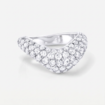 A curved pavé diamond ring in a white gold setting, photographed on a clean light gray background.