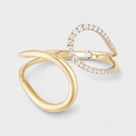 A gold open cuff with two interlocking loop designs, one adorned with a row of clear pavé-set round diamonds. The cuff is photographed on a clean, light gray background.