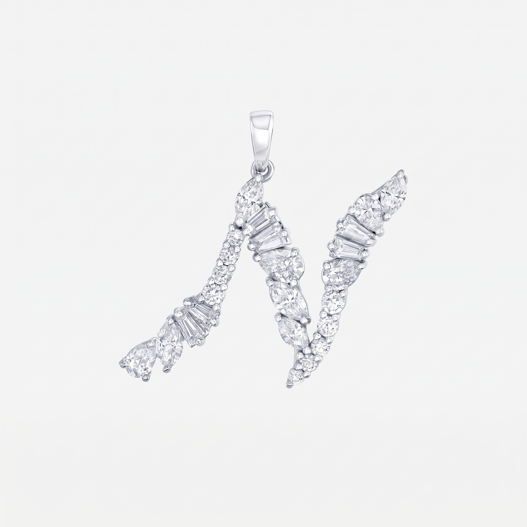 A white gold letter 'N' pendant embellished with mixed cut diamonds, shown on a plain light gray background.