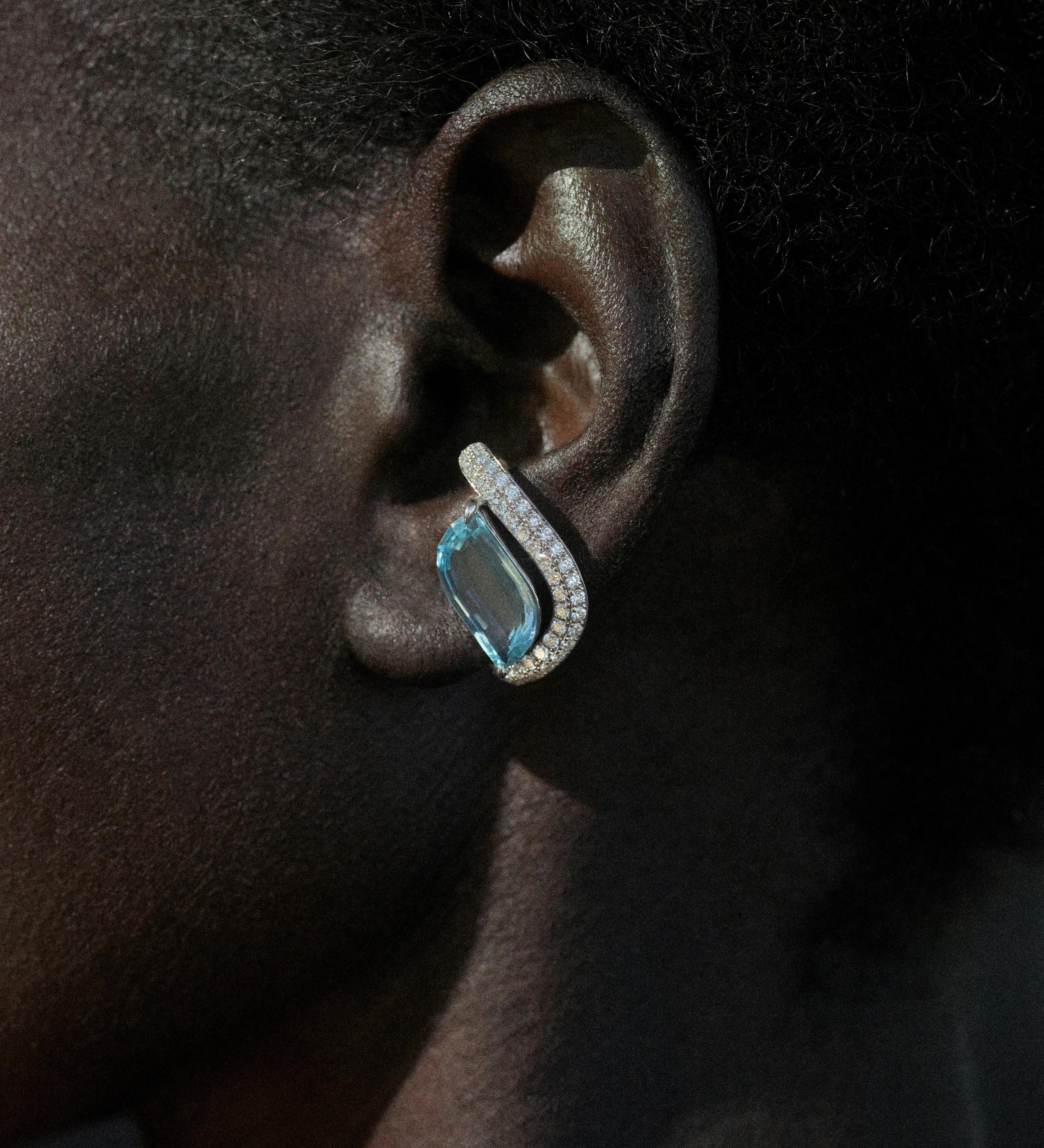 One of a kind wave diamond earring set in gold designed by isabel Delgado