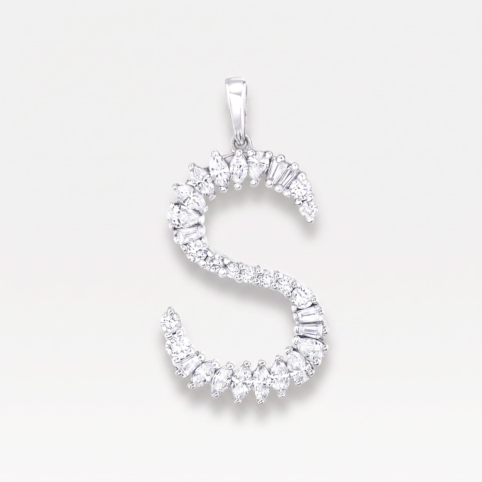 An elegant S pendant shaped like the letter 'S', adorned with mixed cut diamonds, set against a light gray background.