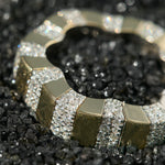 Gold and diamond ring in the shape of a flower