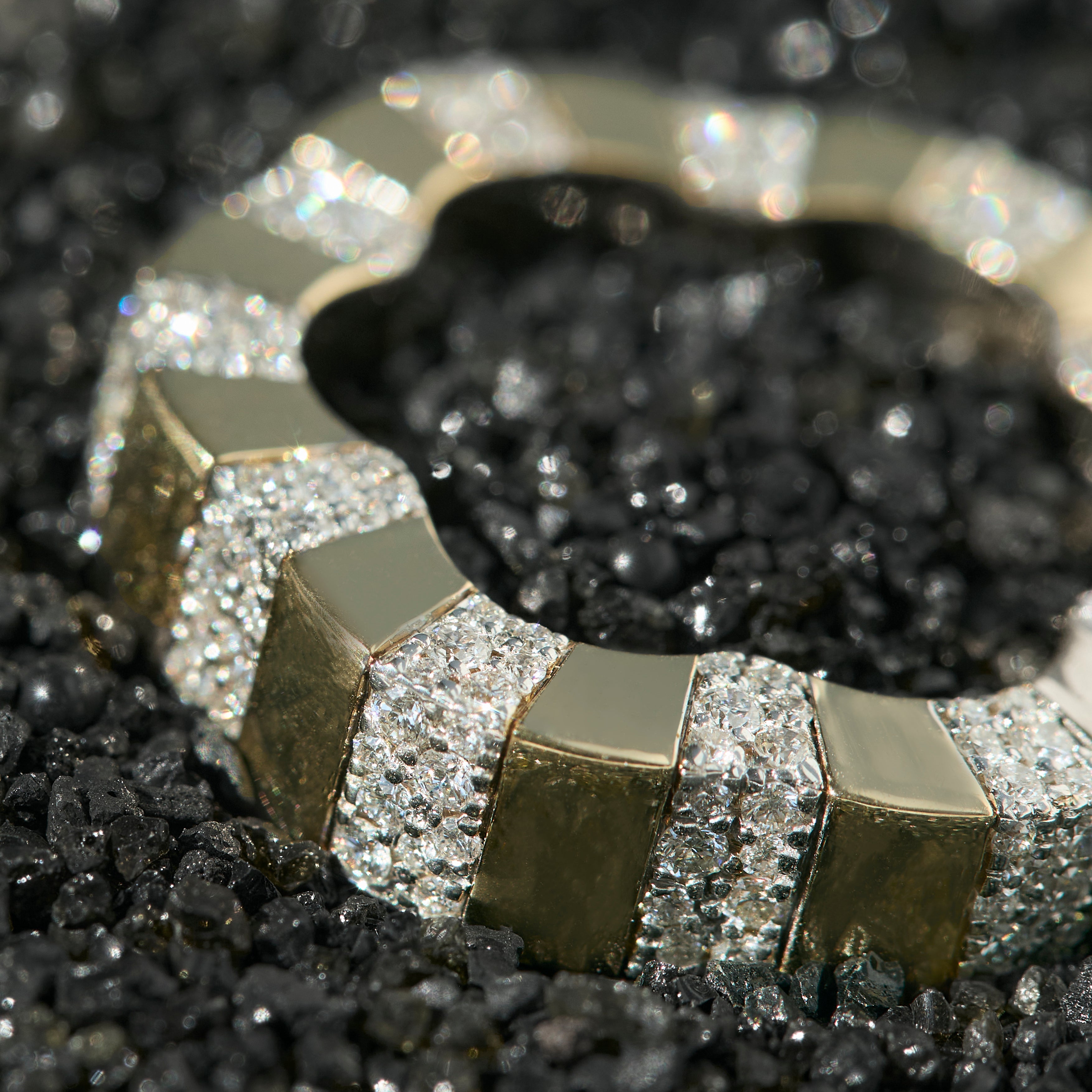 Gold and diamond ring in the shape of a flower