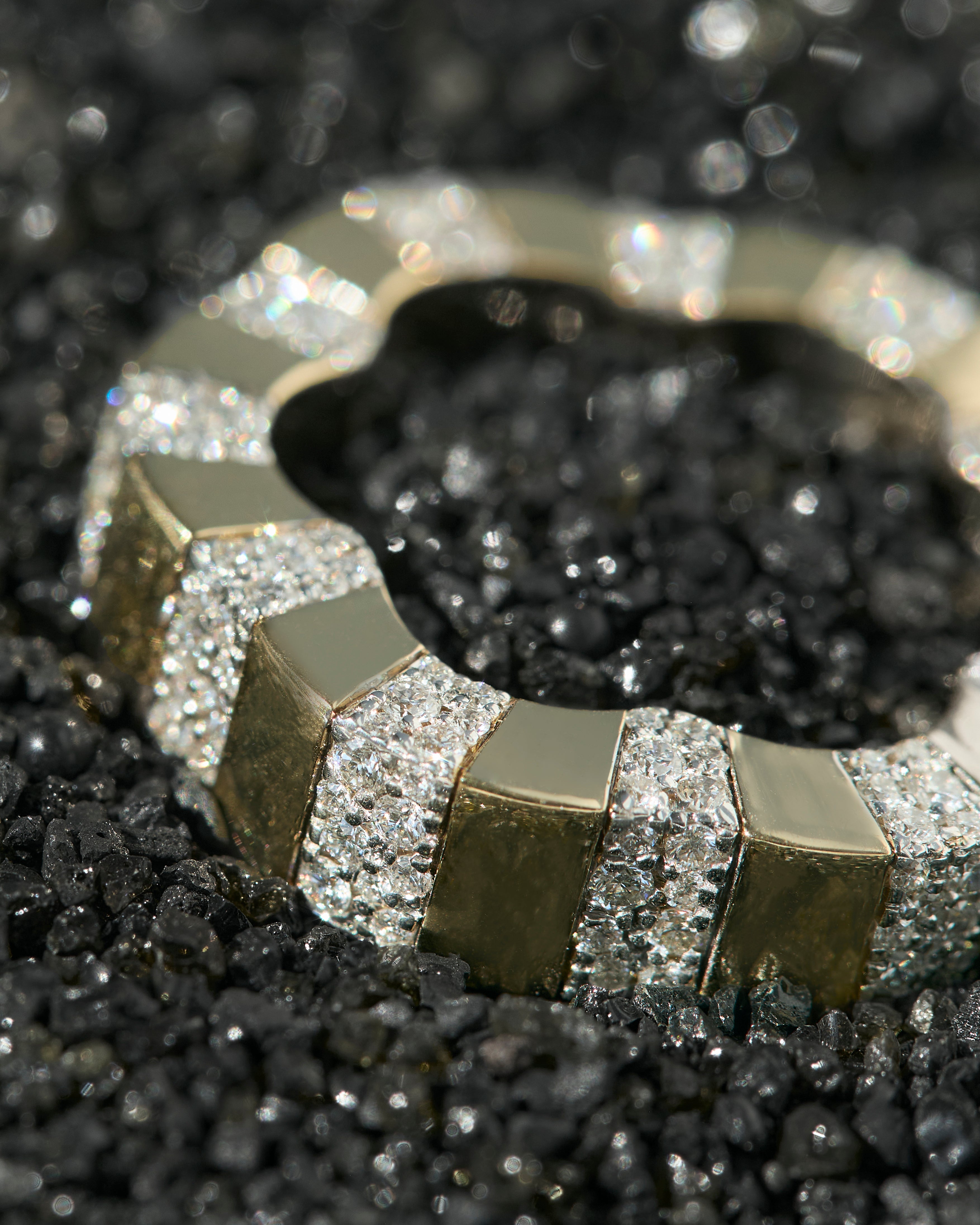 Gold and diamond ring in the shape of a flower