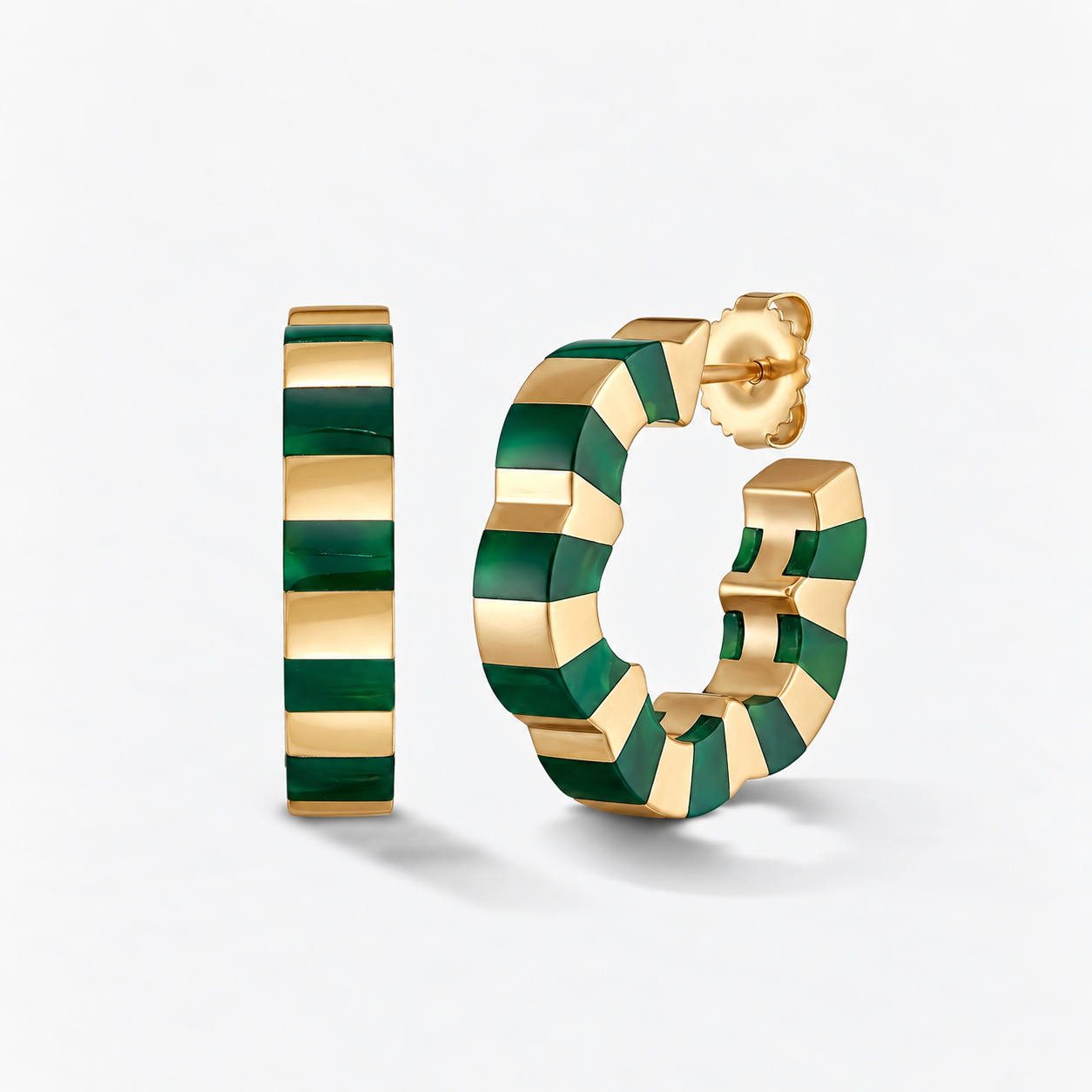 A pair of gold hoop earrings with alternating agate and gold striped segments, shown on a clean white background.