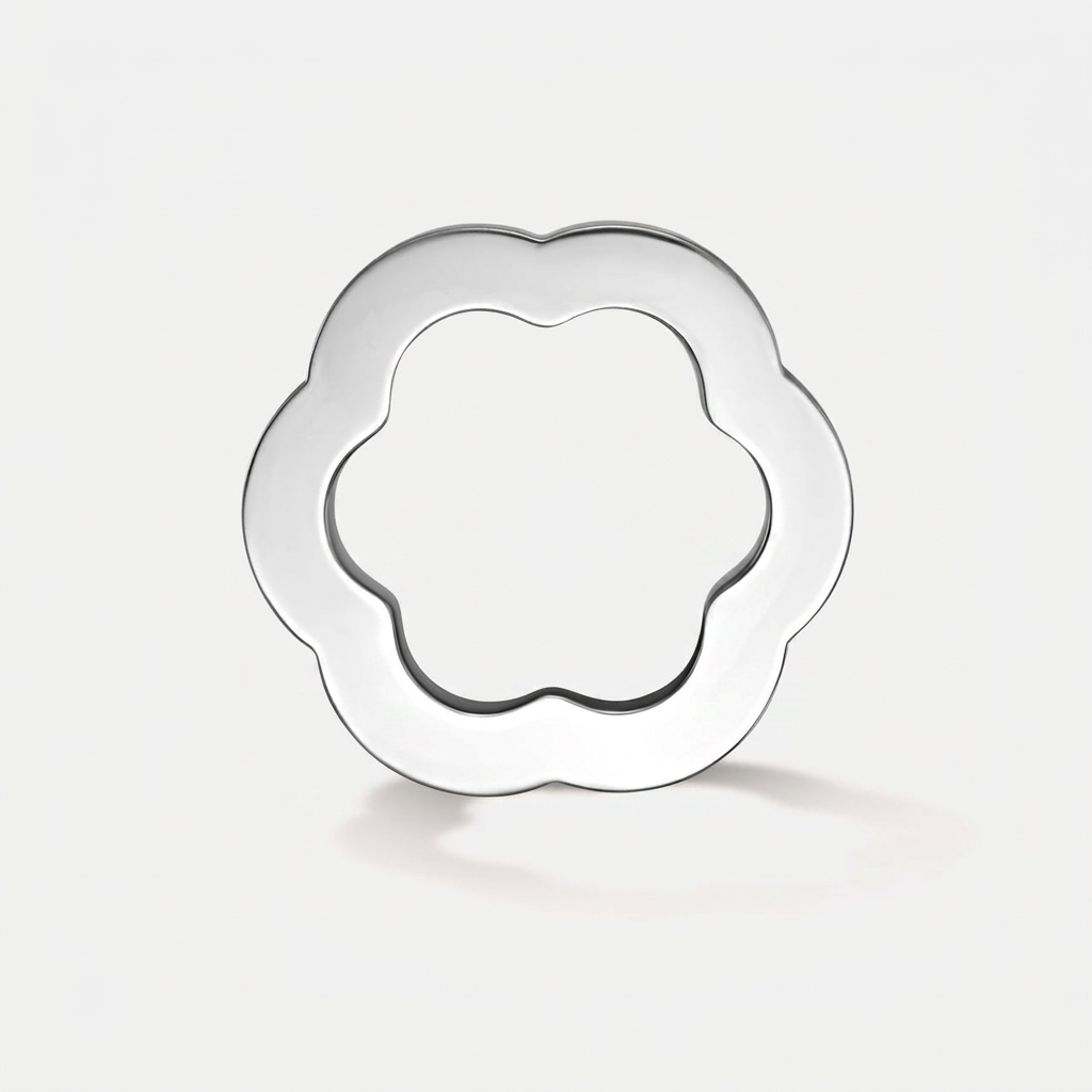 A polished silver-tone metal ring with a flower-shaped outline, shown on a clean light gray background.