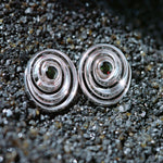 Isabel Delgado designed spiral studs with tourmaline center stones