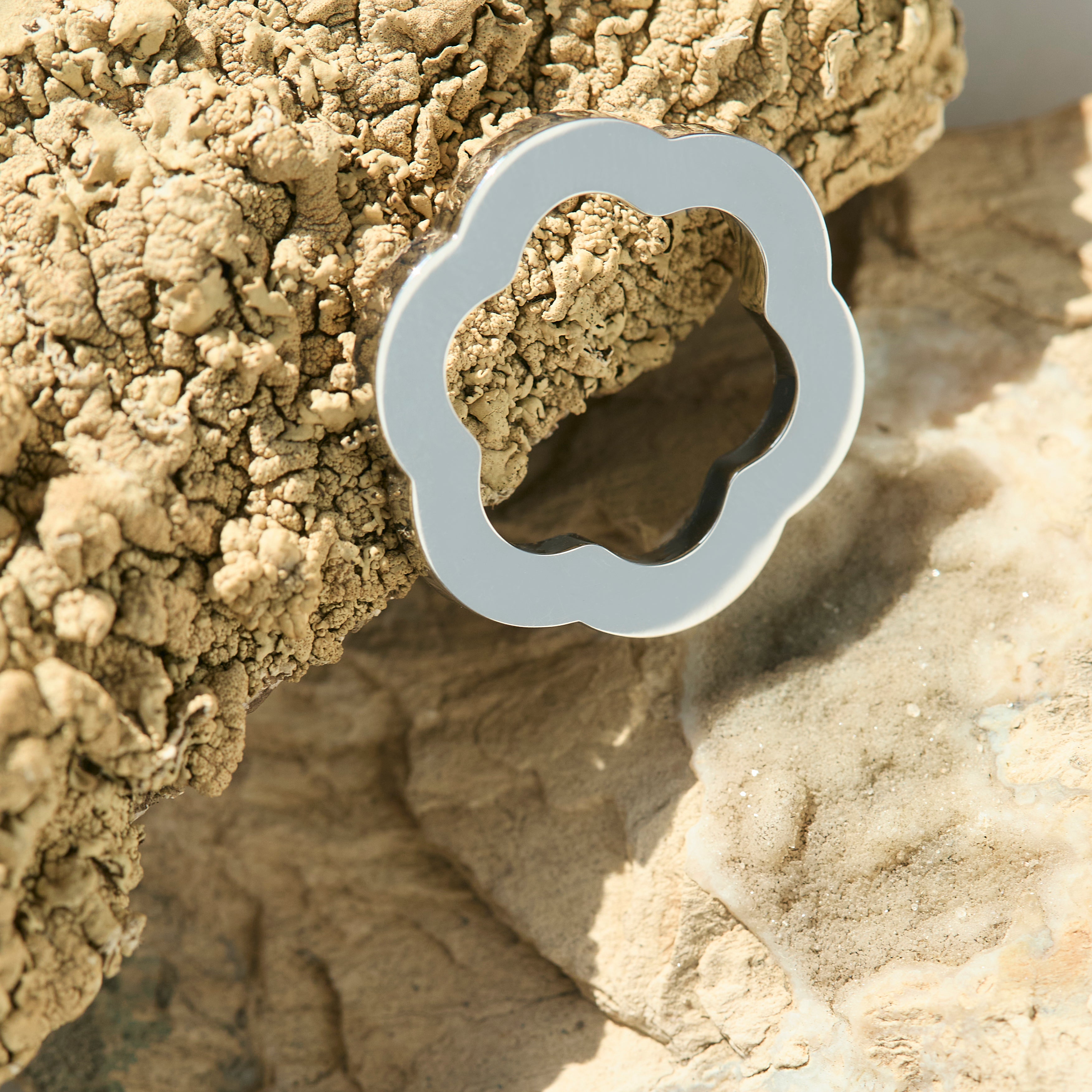Flower shaped sofia ring designed by Isabel Delgado