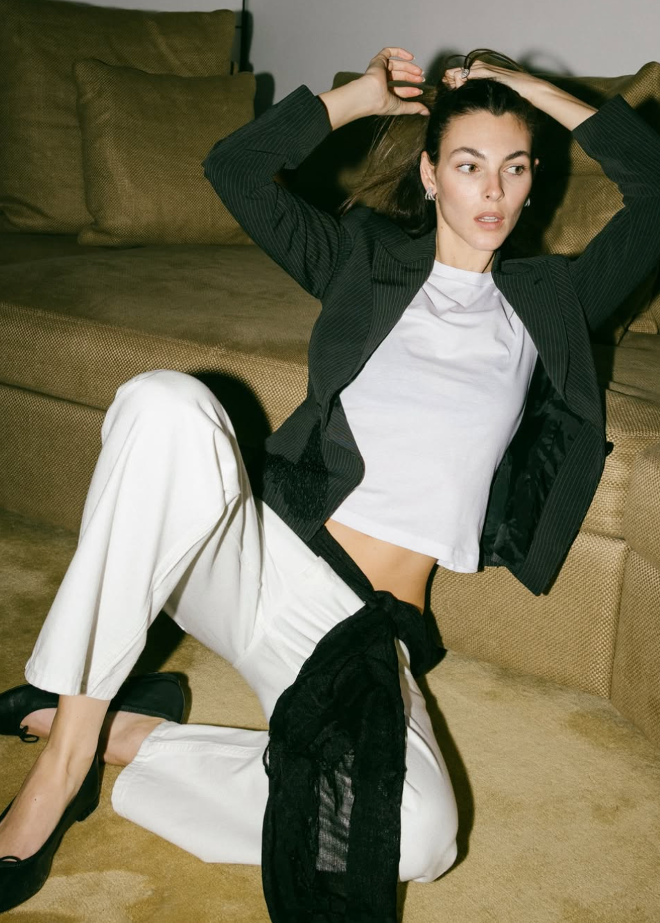 Vittoria Ceretti wearing the triple row diamond earrings for Paris fashion week 2026, styled by Natasha Colvin.