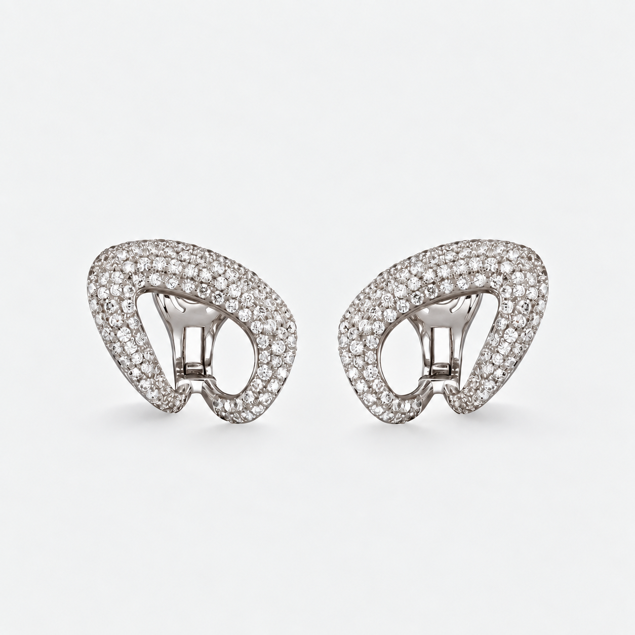 curved diamond earrings with diamonds