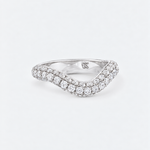 A silver wavy band ring paved with round diamonds, shown on a clean white background. The inside of the band features a small 'RS' logo engraving.