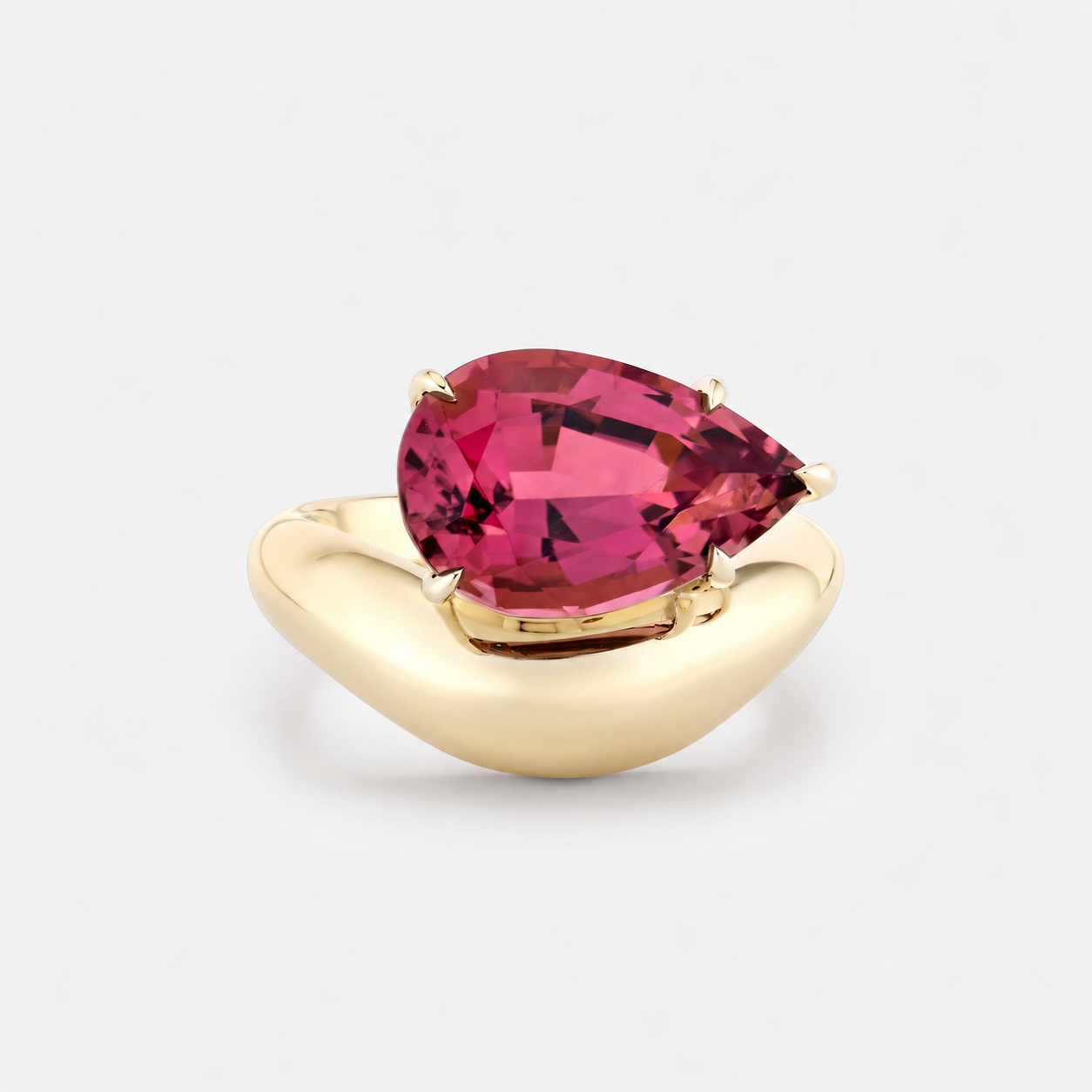 magenta tourmaline wave ring on gold