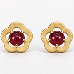 flower shaped studs with cabochon cut rubies