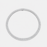 A silver-toned tennis necklace with pear cut diamonds shown on a light gray background.