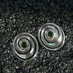 Studs in the shape of a spiral set with green tourmalines