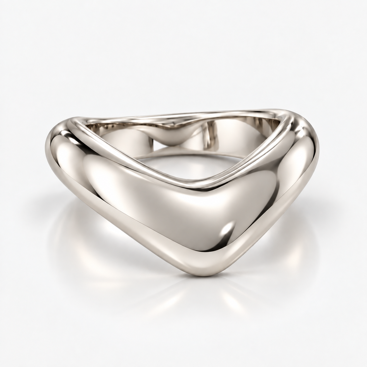 A polished silver ring with a smooth, flowing triangular or chevron-like open design, shown on a clean white background with a soft reflection.