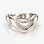 A polished silver ring with a smooth, flowing triangular or chevron-like open design, shown on a clean white background with a soft reflection.